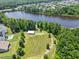 Scenic aerial view of a lake and walking trails offering tranquil escape and recreation within the community at 529 Lake Gaston Dr, Fuquay Varina, NC 27526