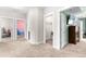 Hallway with views to bedroom, laundry room, and bonus room at 529 Lake Gaston Dr, Fuquay Varina, NC 27526