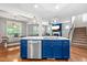 Kitchen island includes a stainless steel dishwasher and views of the dining area and living space at 529 Lake Gaston Dr, Fuquay Varina, NC 27526