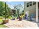 Outdoor patio featuring Adirondack chairs around a fire pit, perfect for gathering with friends and Gathering at 529 Lake Gaston Dr, Fuquay Varina, NC 27526