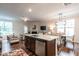 Spacious living area with hardwood floors, eat in kitchen, and an open floor plan at 6147 Beale Loop, Raleigh, NC 27616