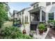 A landscaped patio area with potted plants, offering a comfortable outdoor retreat near the home at 6147 Beale Loop, Raleigh, NC 27616