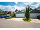 Three-car garages and driveways; blue car parked to the left at 644 Granite Mill Blvd, Chapel Hill, NC 27516