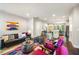 Sunlit living room showcases an open layout, stylish decor, and beautiful hardwood floors at 644 Granite Mill Blvd, Chapel Hill, NC 27516