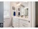 Bright main bathroom features a dual sink vanity, natural light, and modern fixtures at 644 Granite Mill Blvd, Chapel Hill, NC 27516