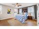 Cozy main bedroom boasts natural light, ceiling fan, and ensuite bathroom at 644 Granite Mill Blvd, Chapel Hill, NC 27516