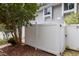 Backyard with a white fence and tree at 7159 Sandy Creek Dr, Raleigh, NC 27615