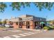 Starbucks building with outdoor seating, drive thru and parking lot at 7159 Sandy Creek Dr, Raleigh, NC 27615
