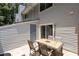 View of a patio with a table and chairs at 7159 Sandy Creek Dr, Raleigh, NC 27615