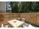 View of a patio featuring a stone table and chairs at 7159 Sandy Creek Dr, Raleigh, NC 27615