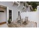 Comfortable patio seating area with privacy fence provides a relaxing outdoor space at 7159 Sandy Creek Dr, Raleigh, NC 27615