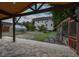 Backyard featuring a chicken coop, greenhouse, and manicured lawn creating an engaging outdoor space at 723 Lindley Dr, Durham, NC 27703