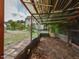 Fenced in chicken coop with a dirt floor, perfect for providing a safe and comfortable outdoor space for chickens at 723 Lindley Dr, Durham, NC 27703