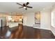 Open-concept living room features hardwood floors and flows seamlessly into the modern kitchen at 723 Lindley Dr, Durham, NC 27703