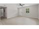 Bright living space features neutral walls, updated flooring, and a view to the front yard at 768 Lunar Dr, Raleigh, NC 27610