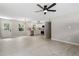 Spacious living area showcases new flooring, neutral walls, and an open layout to the kitchen at 768 Lunar Dr, Raleigh, NC 27610