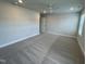 Neutral-toned bedroom with ceiling fan, carpet flooring, recessed lighting and natural light at 805 Portland Rose Dr, Knightdale, NC 27545