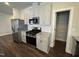 Beautiful kitchen design with stainless steel appliances and a convenient pantry for storage at 805 Portland Rose Dr, Knightdale, NC 27545