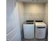 Laundry room with washer and dryer hookups and a convenient shelving unit at 805 Portland Rose Dr, Knightdale, NC 27545