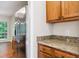 Modern kitchen features stainless steel refrigerator and granite countertops at 809 Green Passage Ln, Apex, NC 27502