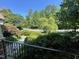 Lush front yard with mature landscaping at 8228 Clarks Branch Dr, Raleigh, NC 27613