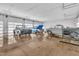 Spacious garage featuring multiple classic cars, epoxy floors, and ample lighting for car enthusiasts at 8510 Dunlee Falls Rd, Raleigh, NC 27613