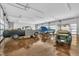 Spacious garage with multiple bays and finished concrete floors, perfect for car enthusiasts at 8510 Dunlee Falls Rd, Raleigh, NC 27613