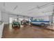 Spacious garage with multiple bays and finished concrete floors, perfect for car enthusiasts at 8510 Dunlee Falls Rd, Raleigh, NC 27613