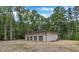 Detached garage with four bays offering ample storage and parking space at 8510 Dunlee Falls Rd, Raleigh, NC 27613