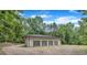 Detached garage with four bays offering ample storage and parking space at 8510 Dunlee Falls Rd, Raleigh, NC 27613