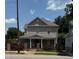 Charming two-story home with a covered front porch and a well-maintained yard in a great neighborhood at 903 New Bern Ave, Raleigh, NC 27601