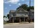 Charming two-story home featuring a covered front porch and a well-maintained yard in a great neighborhood at 903 New Bern Ave, Raleigh, NC 27601