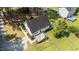 Aerial view of a home showing a backyard with deck and fenced yard at 918 Circle Dr, Angier, NC 27501