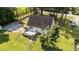 Aerial view of a home showing backyard with deck, fenced yard, and privacy at 918 Circle Dr, Angier, NC 27501
