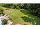 Large backyard with a wooden deck and full-size fence at 918 Circle Dr, Angier, NC 27501