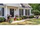 Charming home featuring a welcoming front door and beautifully landscaped garden at 918 Circle Dr, Angier, NC 27501