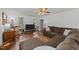 Inviting living room with laminate floors, a large sectional, and plenty of natural light at 918 Circle Dr, Angier, NC 27501