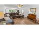 A spacious living room with hardwood floors and plenty of natural light at 918 Circle Dr, Angier, NC 27501
