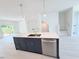 Bright open concept kitchen features quartz countertops and stainless steel appliances at 1007 Regalia Rd # 31, Durham, NC 27713