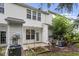 Backyard of townhome with patio, garden, AC unit and siding at 109 Grey Elm Trl, Durham, NC 27713