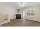 Spacious living room with fireplace and staircase to the upper level at 109 Grey Elm Trl, Durham, NC 27713