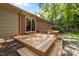 An outdoor area with a wood deck is accessible through sliding glass doors at 111 Lattimore Ln, Durham, NC 27713