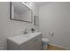 Well-maintained bathroom featuring modern vanity and tile flooring at 111 Lattimore Ln, Durham, NC 27713