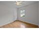 This bedroom features a window for natural light and closet for storage at 111 Lattimore Ln, Durham, NC 27713