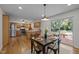 Eat-in kitchen leading to the backyard deck through sliding glass doors at 111 Lattimore Ln, Durham, NC 27713