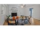 Living room with a white brick fireplace and access to the doorway at 111 Lattimore Ln, Durham, NC 27713