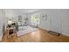 Bright living room featuring a bay window and hardwood floors, creating a warm and inviting atmosphere at 111 Lattimore Ln, Durham, NC 27713