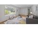 Open living room with hardwood floors and natural light, offering a versatile space for relaxation and entertainment at 111 Lattimore Ln, Durham, NC 27713