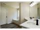 Bathroom with dual sink vanity and tub at 114 Seastone St, Raleigh, NC 27603