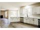 Beautiful kitchen featuring quartz countertops and stainless steel appliances at 114 Seastone St, Raleigh, NC 27603